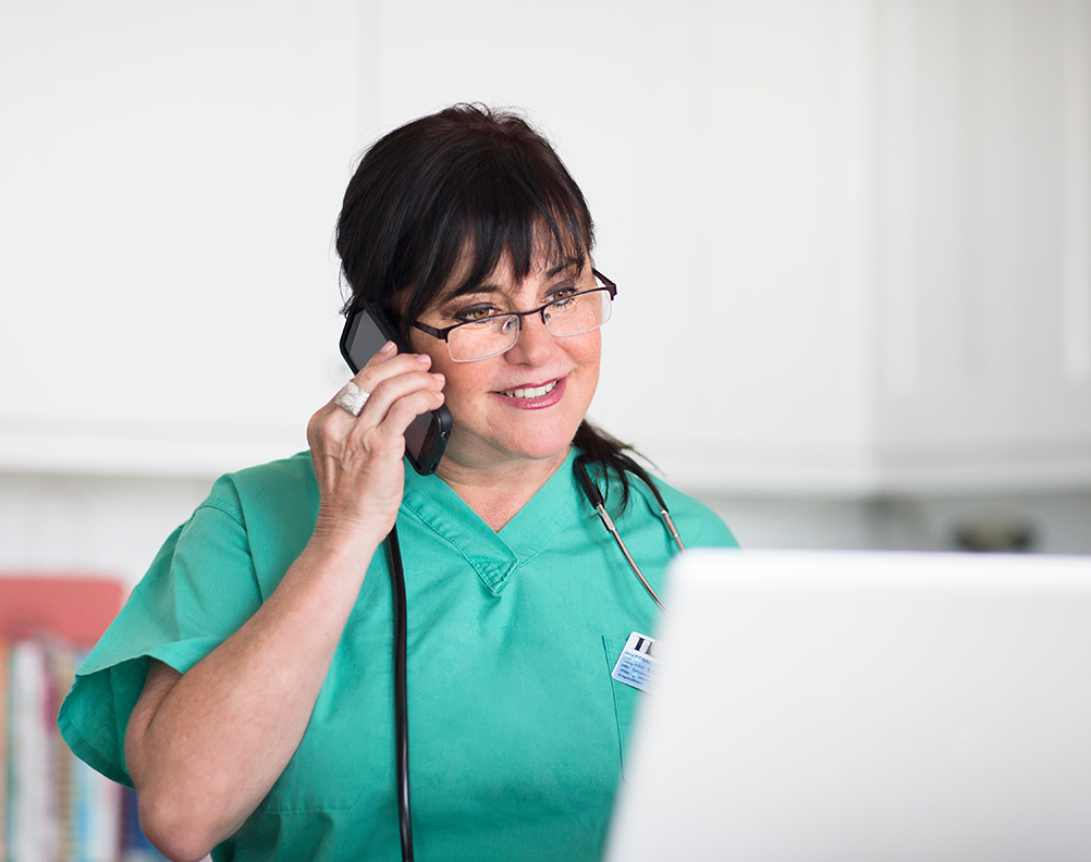 Nurse on the phone with a patient