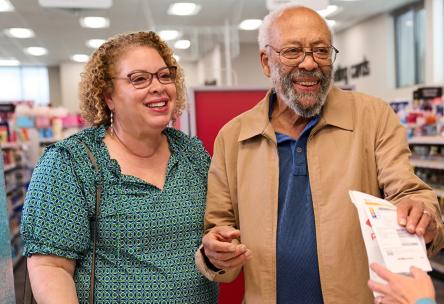 A man and a woman at a pharmacy.