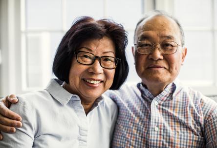 A couple wearing glasses.
