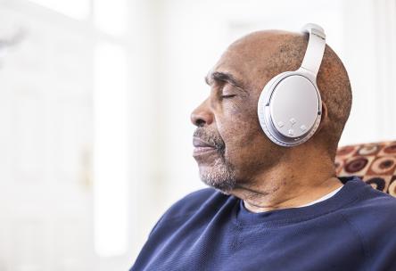 Person listening to headphones