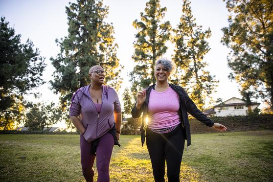 two elders walk outside