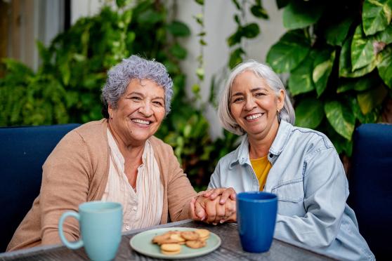 Two women smiling