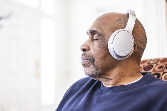 Person listening to headphones